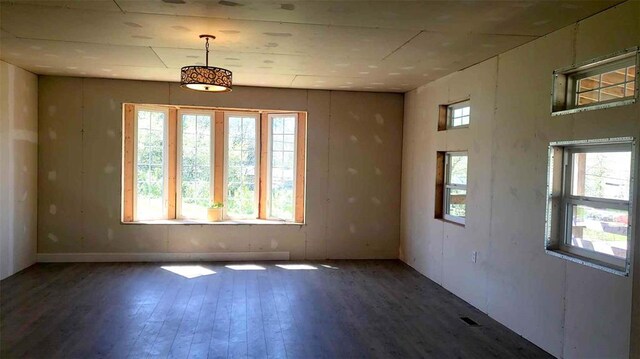 2357 Pine St, Centerville, MO 63633 - spare room featuring hardwood / wood-style floors