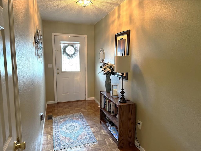 113 Fairway Dr, Maryville, IL 62062 - foyer featuring baseboards and a textured ceiling