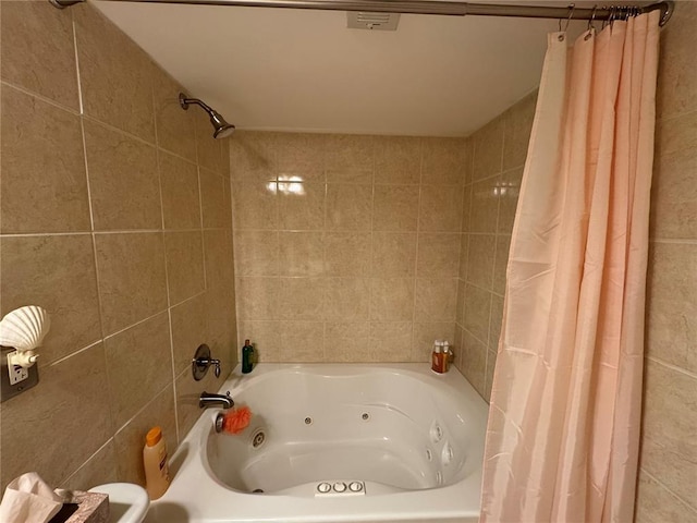 113 Fairway Dr, Maryville, IL 62062 - bathroom featuring a combined bath / shower with jetted tub and tile walls