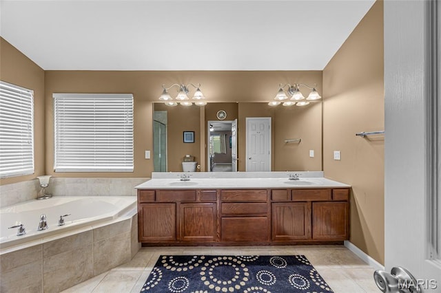 8525 Sagamore Dr, Cedar Hill, MO 63016 - bathroom featuring a garden tub, tile patterned floors, double vanity, and a stall shower
