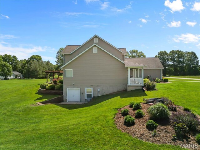 8525 Sagamore Dr, Cedar Hill, MO 63016 - rear view of property featuring a yard and a garage