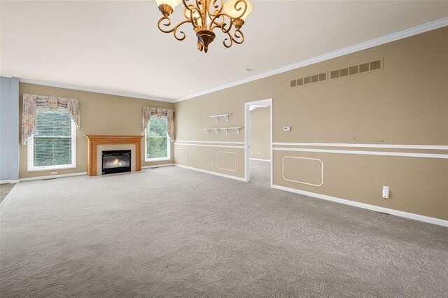734 River Glen Dr, Ofallon, MO 63368 - unfurnished living room with ornamental molding, a chandelier, carpet, baseboards, and a fireplace with flush hearth
