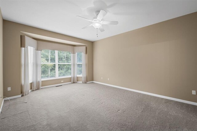 734 River Glen Dr, Ofallon, MO 63368 - carpeted spare room with ceiling fan and baseboards