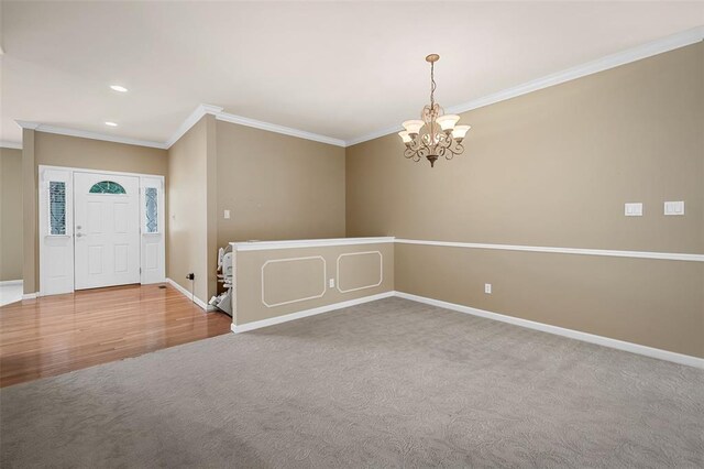734 River Glen Dr, Ofallon, MO 63368 - foyer with crown molding, carpet, a chandelier, baseboards, and recessed lighting