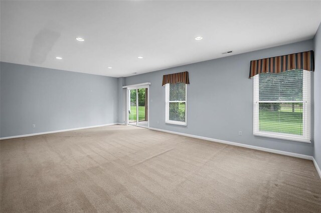 734 River Glen Dr, Ofallon, MO 63368 - spare room with baseboards, recessed lighting, and carpet floors