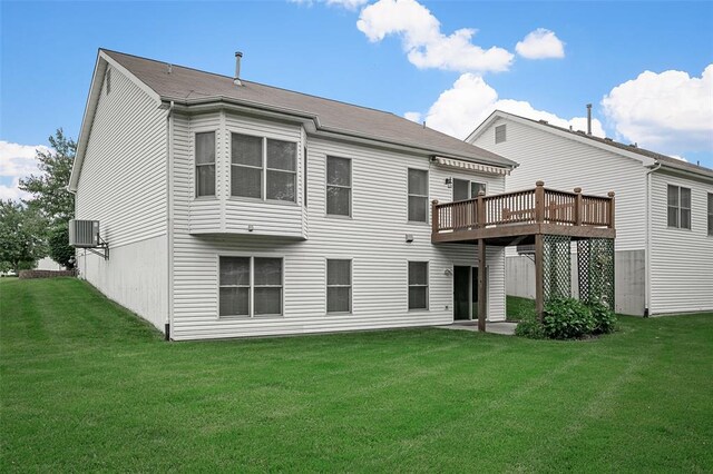 734 River Glen Dr, Ofallon, MO 63368 - rear view of property featuring central AC unit, a lawn, and a wooden deck
