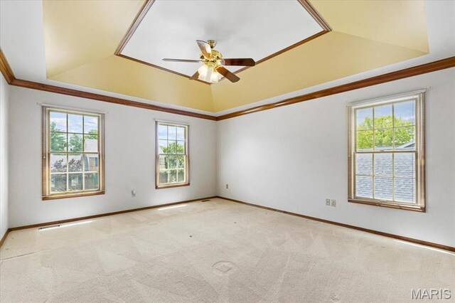 767 Carman Meadows Dr S, Manchester, MO 63021 - empty room with a raised ceiling, a ceiling fan, carpet floors, vaulted ceiling, and crown molding