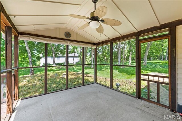 767 Carman Meadows Dr S, Manchester, MO 63021 - unfurnished sunroom with a water view, a ceiling fan, and lofted ceiling
