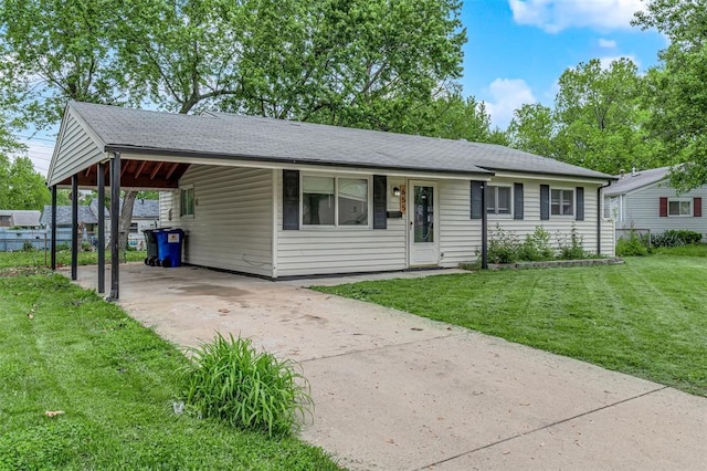 655 5th Plz, Florissant, MO 63031 - ranch-style home with driveway and an attached carport
