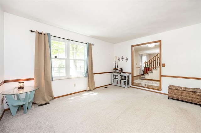 14 Shallowbrook Dr, Ofallon, IL 62269 - carpeted empty room featuring stairs and baseboards