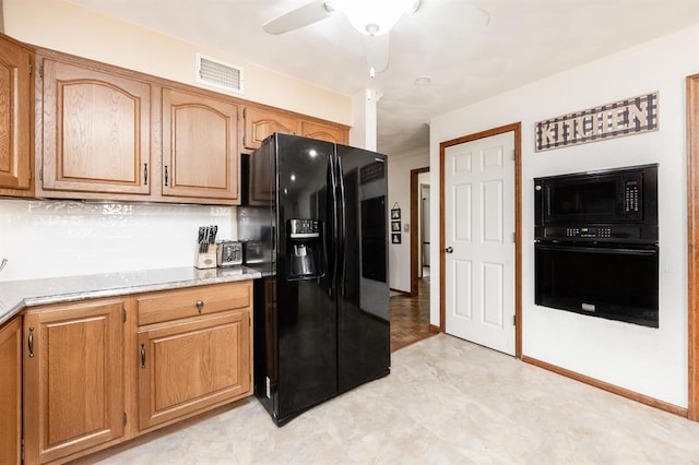 14 Shallowbrook Dr, Ofallon, IL 62269 - kitchen with black appliances, ceiling fan, light countertops, and light flooring