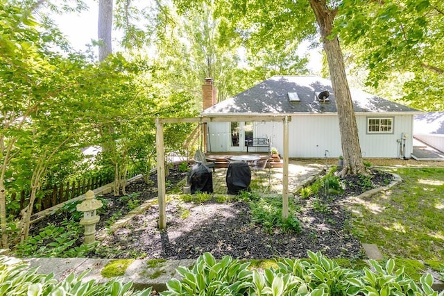 14 Shallowbrook Dr, Ofallon, IL 62269 - rear view of house with a patio area and a chimney