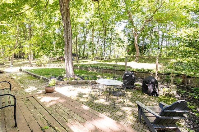 14 Shallowbrook Dr, Ofallon, IL 62269 - wooden terrace featuring a patio area, outdoor dining space, and area for grilling