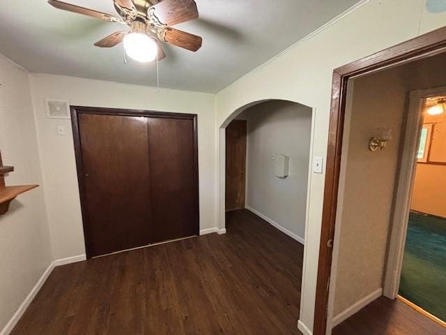 201 Penelope Pl, Olympian Village, MO 63020 - hall featuring arched walkways, wood finished floors, and baseboards
