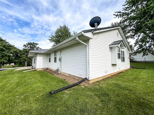 619 Cleveland St, Paris, MO 65275 - view of side of home with a lawn