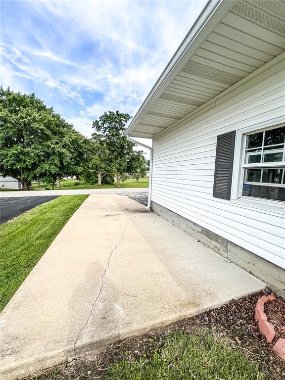 619 Cleveland St, Paris, MO 65275 - view of home's exterior featuring a patio area