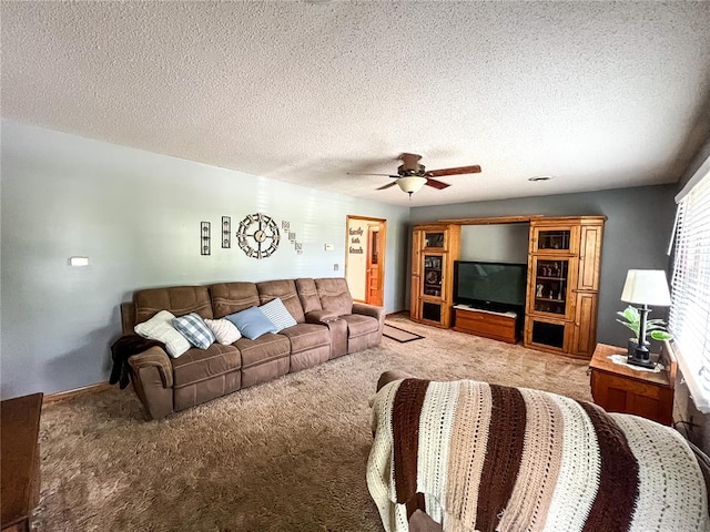 619 Cleveland St, Paris, MO 65275 - living area with light colored carpet, ceiling fan, a textured ceiling, and baseboards