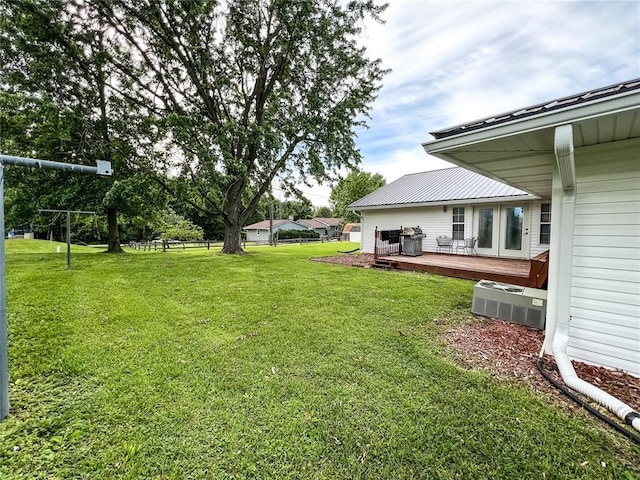 619 Cleveland St, Paris, MO 65275 - view of grassy yard featuring a deck