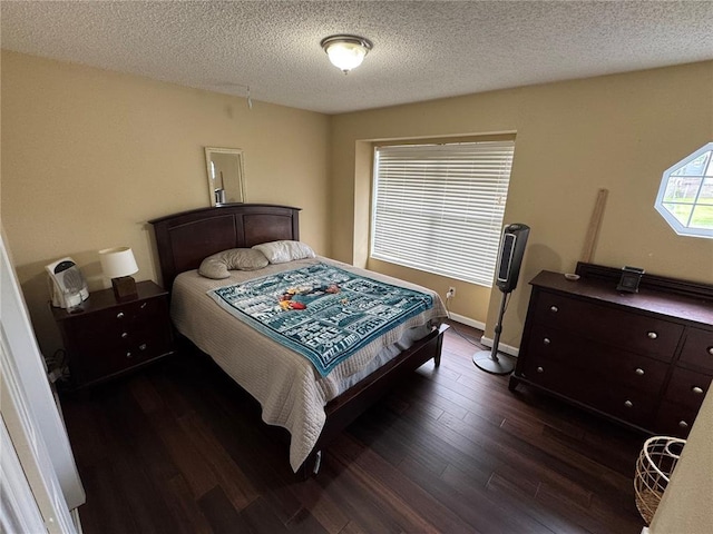 102 Riverview Bend Estates Dr, Crystal City, MO 63019 - bedroom with dark wood finished floors and a textured ceiling