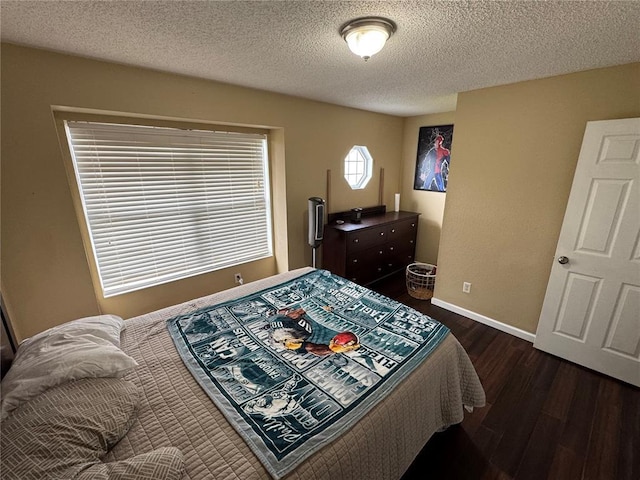 102 Riverview Bend Estates Dr, Crystal City, MO 63019 - bedroom with wood finished floors, a textured ceiling, and baseboards