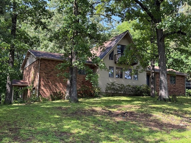 16463 Terrace Dr, Dexter, MO 63841 - view of front of property featuring a front yard and brick siding