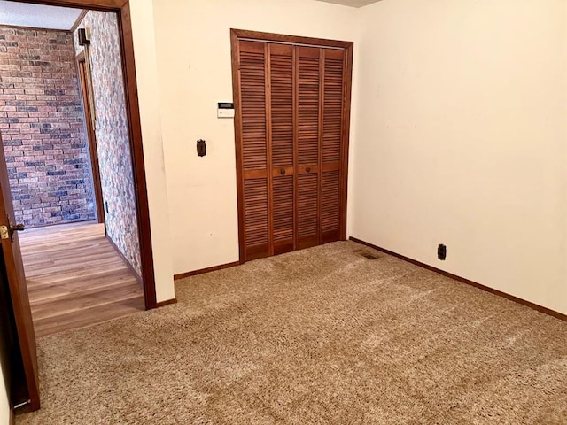 16463 Terrace Dr, Dexter, MO 63841 - unfurnished bedroom with carpet floors, a closet, and baseboards