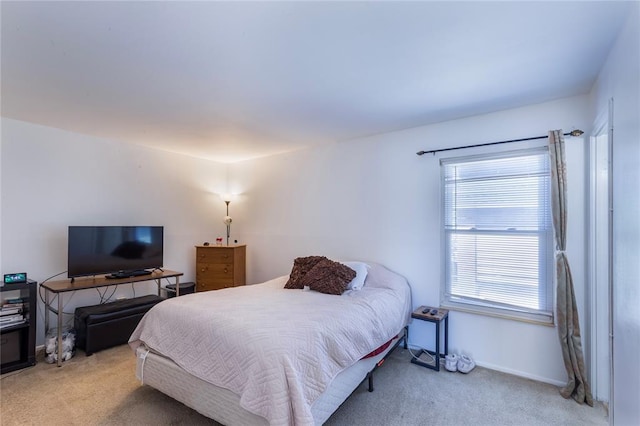 6691 Parker Rd Unit A, Florissant, MO 63033 - bedroom featuring carpet flooring and baseboards