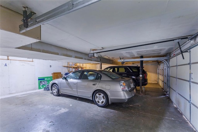 6691 Parker Rd Unit A, Florissant, MO 63033 - garage featuring a garage door opener