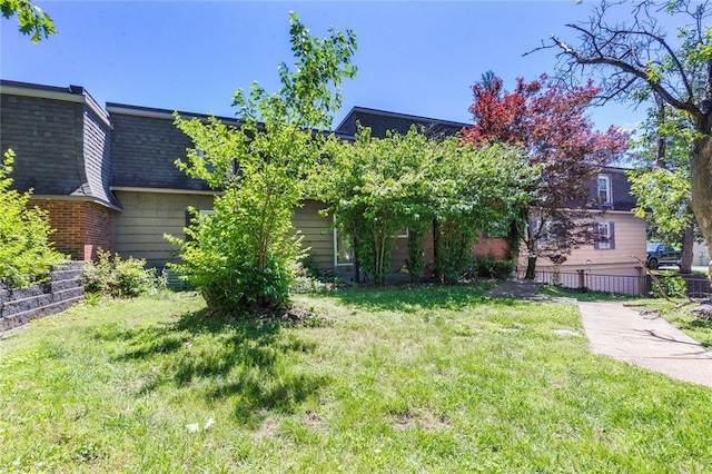 6691 Parker Rd Unit A, Florissant, MO 63033 - view of front facade with roof with shingles