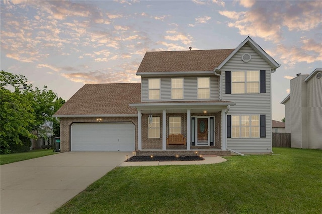 1519 Progress Ln, Belleville, IL 62221 - view of front of property featuring a garage, covered porch, concrete driveway, brick siding, and a shingled roof