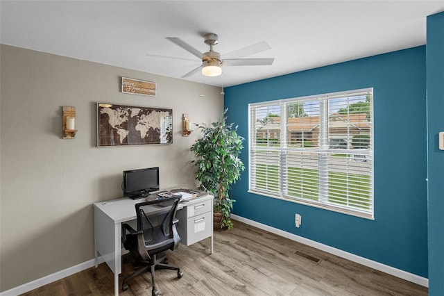 1519 Progress Ln, Belleville, IL 62221 - office area featuring ceiling fan, baseboards, and wood finished floors