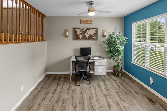 1519 Progress Ln, Belleville, IL 62221 - office area with wood finished floors, a ceiling fan, and baseboards