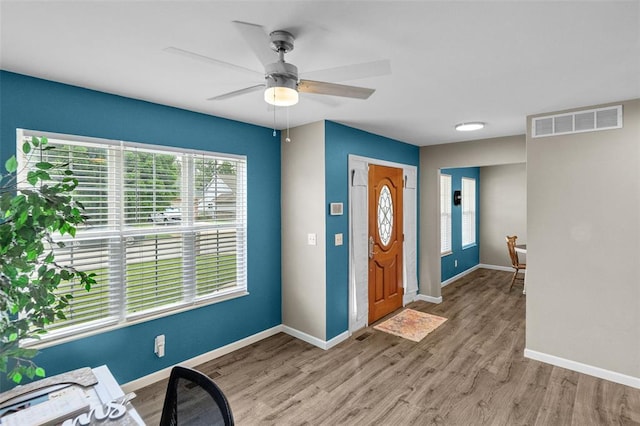 1519 Progress Ln, Belleville, IL 62221 - entrance foyer featuring wood finished floors, baseboards, and ceiling fan