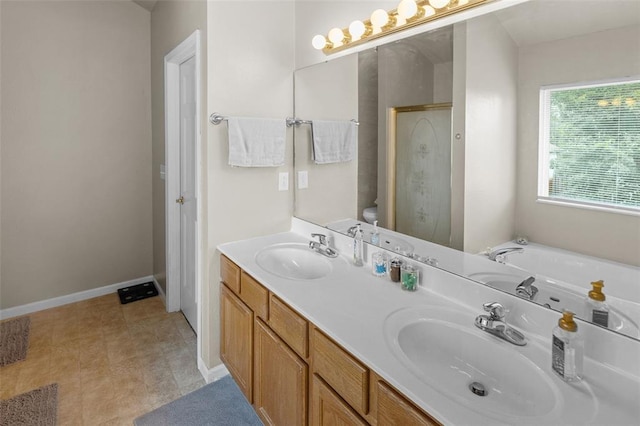 1519 Progress Ln, Belleville, IL 62221 - full bath featuring double vanity, a garden tub, a shower stall, and baseboards