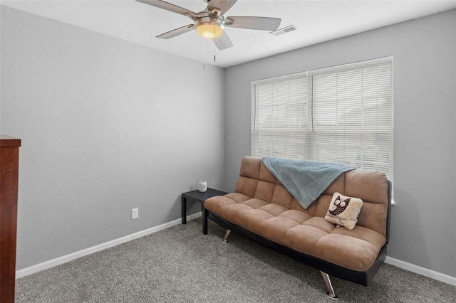 1519 Progress Ln, Belleville, IL 62221 - living area with carpet floors, baseboards, and a ceiling fan