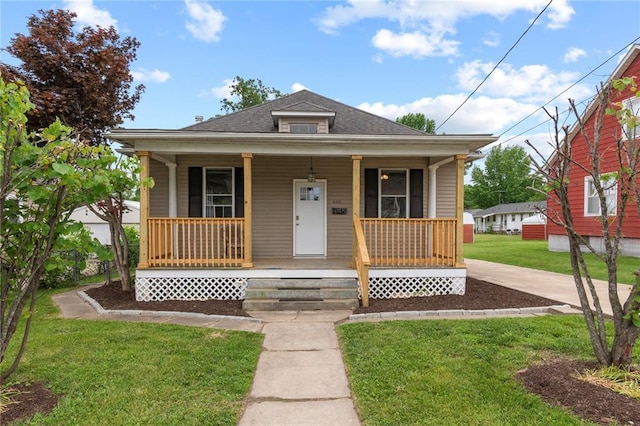 408 W State St, Union, MO 63084 - bungalow featuring a porch, a front yard, and roof with shingles