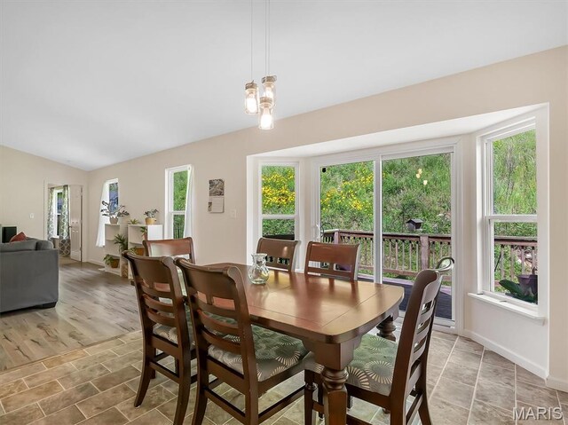1109 Foxwood Estates Dr, Arnold, MO 63010 - dining space featuring baseboards and lofted ceiling