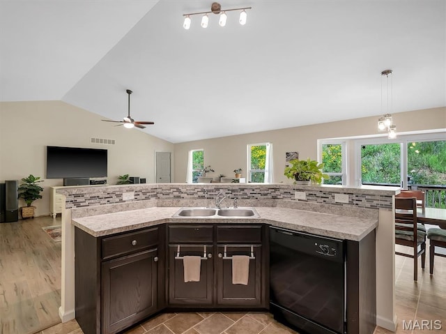1109 Foxwood Estates Dr, Arnold, MO 63010 - kitchen with black dishwasher, a sink, dark brown cabinetry, lofted ceiling, and ceiling fan