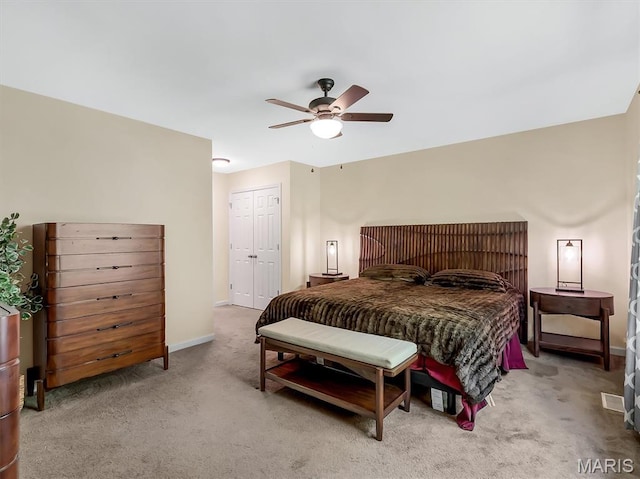 1109 Foxwood Estates Dr, Arnold, MO 63010 - carpeted bedroom with baseboards, a closet, and ceiling fan