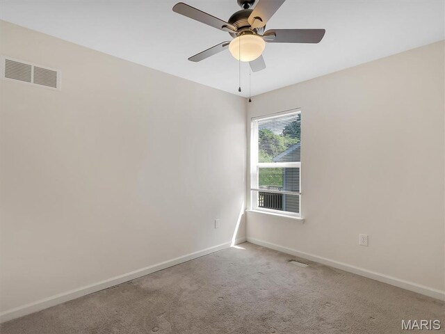 1109 Foxwood Estates Dr, Arnold, MO 63010 - carpeted spare room featuring baseboards and a ceiling fan