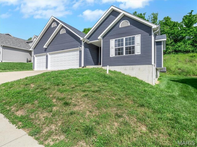 1109 Foxwood Estates Dr, Arnold, MO 63010 - ranch-style home featuring an attached garage, a front yard, and concrete driveway