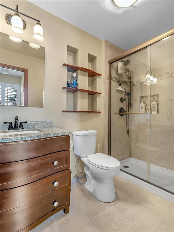 1102 Affirm Dr, Ofallon, IL 62269 - full bathroom featuring toilet, vanity, and a stall shower