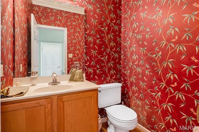 1575 Uthoff Dr, Fenton, MO 63026 - half bathroom featuring wallpapered walls and vanity