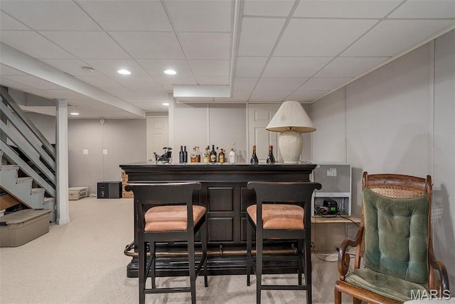 1575 Uthoff Dr, Fenton, MO 63026 - indoor dry bar featuring stairs, carpet, a paneled ceiling, and recessed lighting