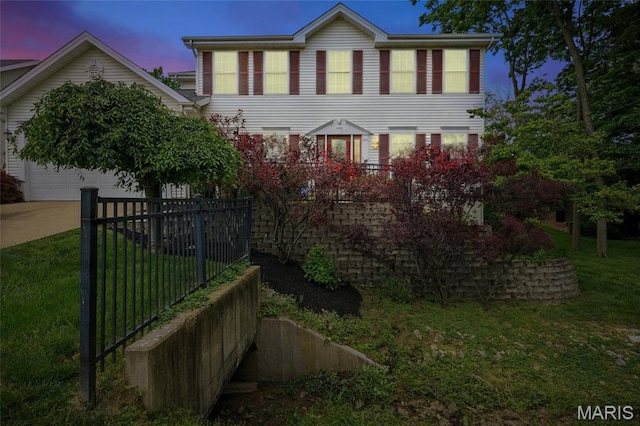 1575 Uthoff Dr, Fenton, MO 63026 - colonial-style house with a lawn and driveway