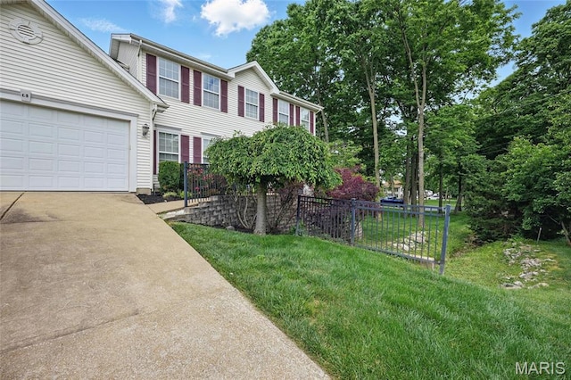 1575 Uthoff Dr, Fenton, MO 63026 - view of front of home with driveway and a garage