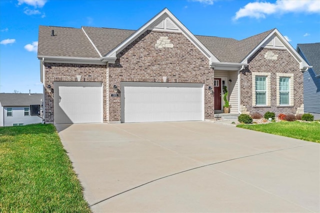 1355 Bloomfield Dr, Eureka, MO 63025 - craftsman house with brick siding, driveway, an attached garage, and a front yard