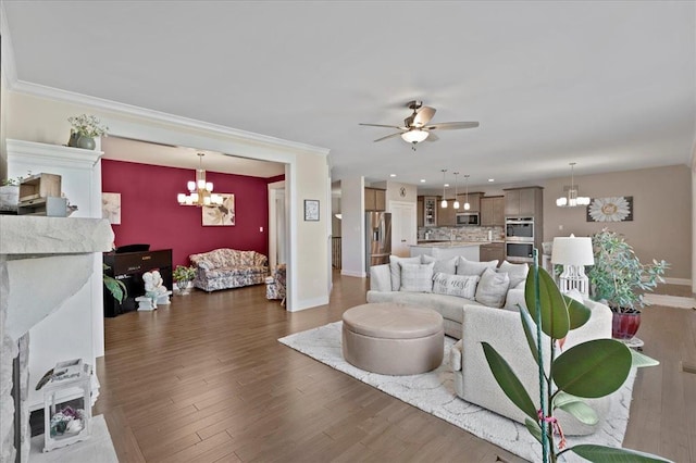 1355 Bloomfield Dr, Eureka, MO 63025 - living room with a chandelier, wood finished floors, baseboards, ornamental molding, and recessed lighting