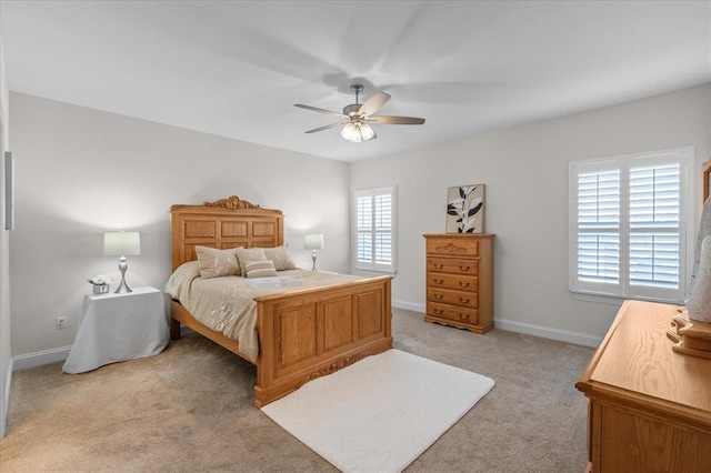 1355 Bloomfield Dr, Eureka, MO 63025 - bedroom featuring light carpet, baseboards, and a ceiling fan