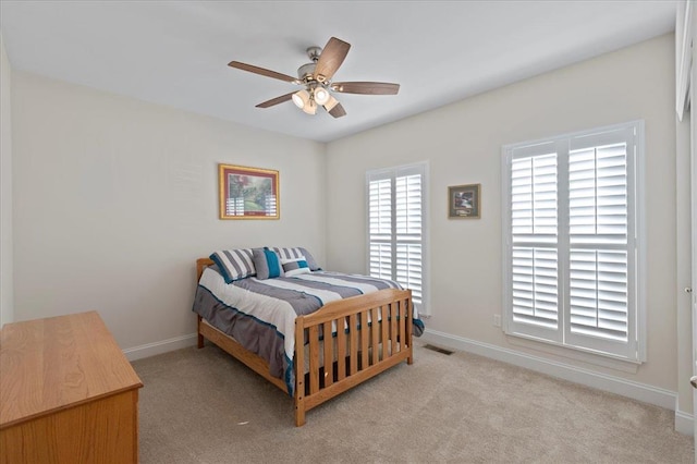 1355 Bloomfield Dr, Eureka, MO 63025 - bedroom with light colored carpet, baseboards, and ceiling fan